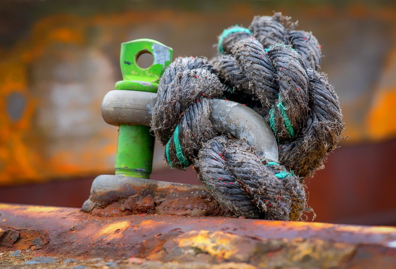 still life, bollard, tied up, metal, day, nature, weathered, art and craft, outdoors, no people, toy, creativity, selective focus, rope, rusty, close-up