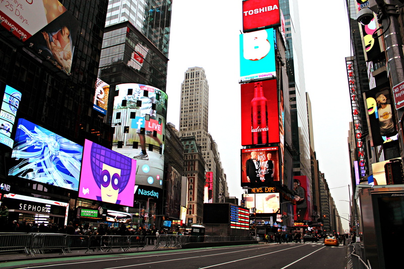 city street, newyork, financial district, sign, communication, text, building exterior, street, outdoors, timessquare, advertisement, office building exterior