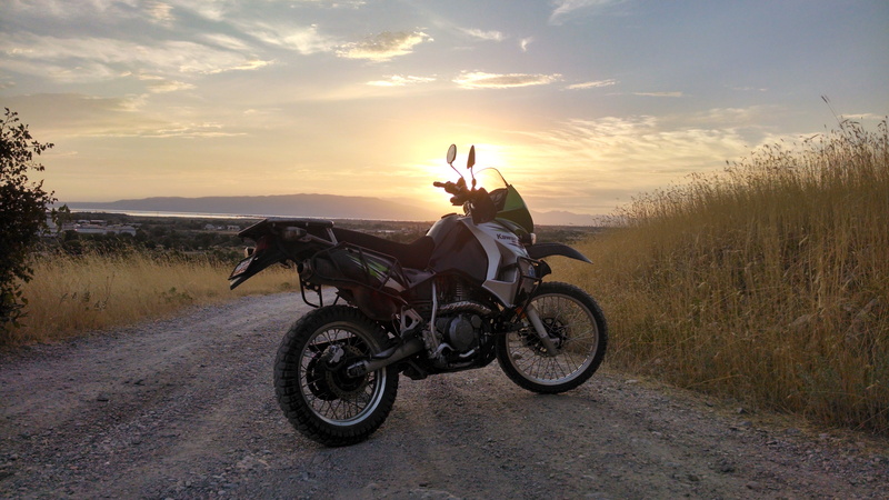 dual sport, land vehicle, nature, riding, full length, sunset, motorcycle, adult, outdoors, transportation, adventure, crash helmet, road trip, klr 650