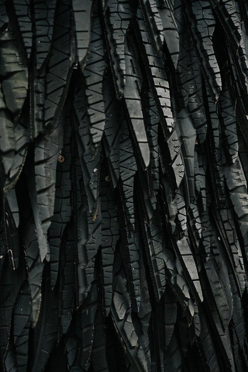vegetation, day, town, high rise, architecture, urban, tire, shredded, textile, pattern, grey, jungle, backgrounds, abundance, plant, no people, hanging