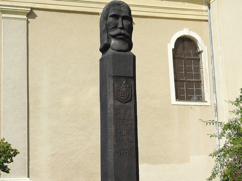 built structure, wood memorial, hungary, the past, art and craft, architectural column, male likeness, window, building, day, craft, balint torok, no people