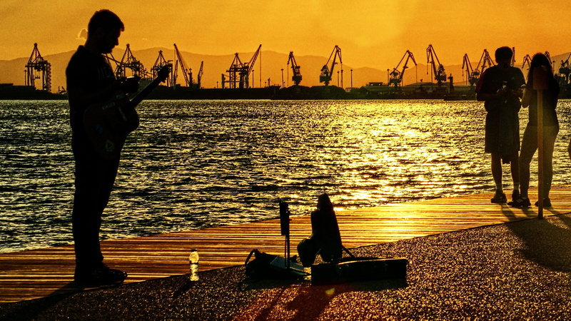 sky, 2K, sea, guitar, crane - construction machinery, thessaloniki, sunset, men, arts culture and entertainment, port, standing, transportation, the piper