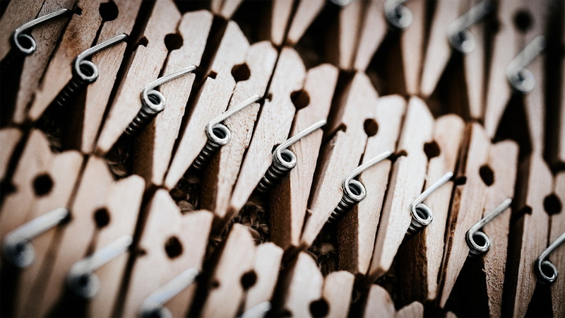 close-up, variation, large group of objects, day, art and craft, man made, black color, pattern, indoors, man made object, wood - material, choice, clothespin