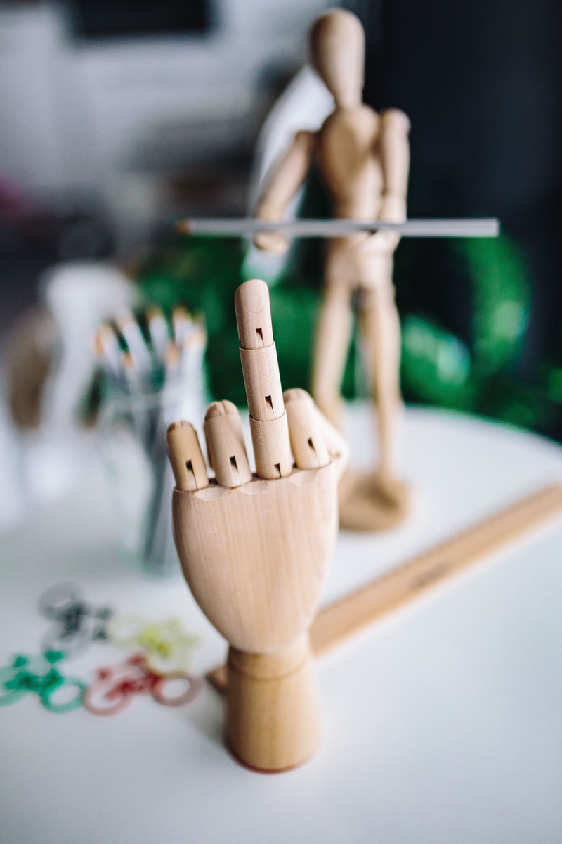 group of objects, wood - Material, mannequin, puppet, no people, day, representation, figure, toy, various, close-up, doll, thread, focus on foreground
