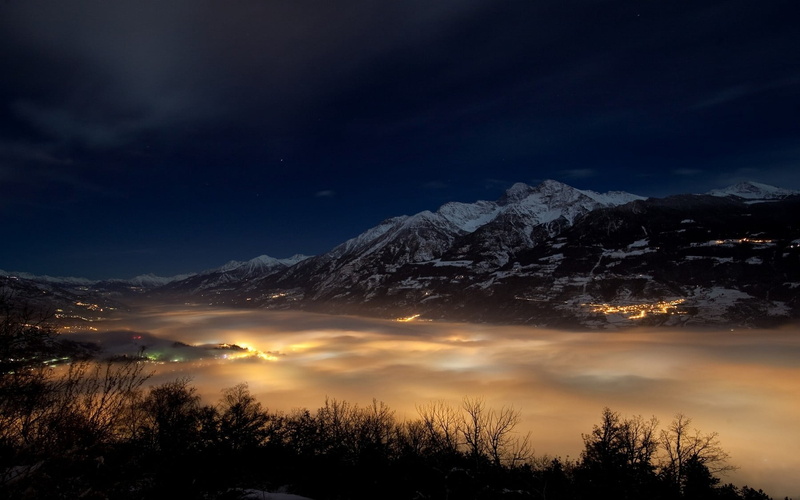 time, winter, sky, tranquility, view, space, snowcapped mountain, mist, mountain, valley, astronomy, tree, city, landscape, mountain range, lights, beauty in nature
