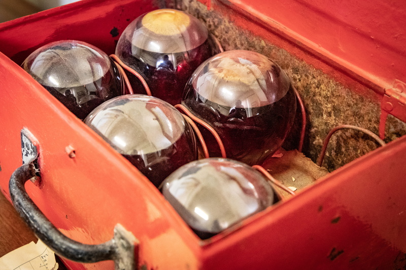 indoors, crash helmet, tree, bowl, red, ball, container, mode of transportation, close-up, car, fir, polythene, choice, food, helmet, group, high angle view