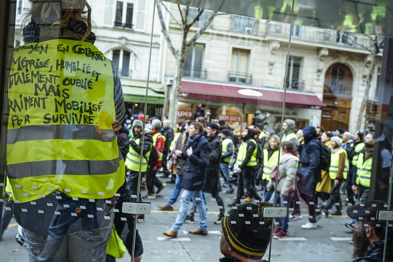 france, shoe, city life, architecture, town, women, law, paris, crash helmet, person, street, day, hardhat, men, metropolis, city street, protestor, government