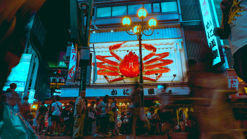 group of people, night, night life, person, inflatable, urban, nighttime, apparel, human, indoors, place of worship, interior design, illuminated, crab