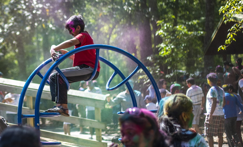 arts culture and entertainment, 2K, denim, incidental people, jeans, day, helmet, focus on foreground, hair, apparel, festival, bicycle, leisure activity