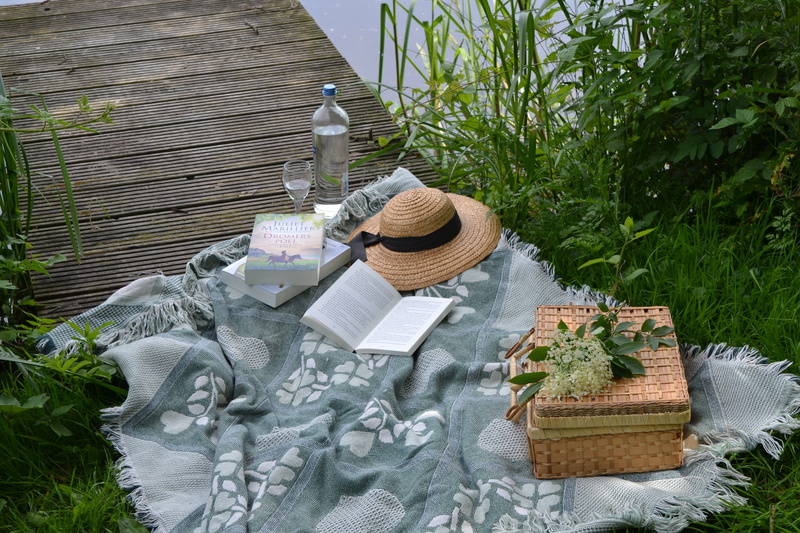 picnic blanket, sombrero, built structure, basket, day, wicker basket, no people, front or back yard, adults only, nature, vacation, box, park, building exterior
