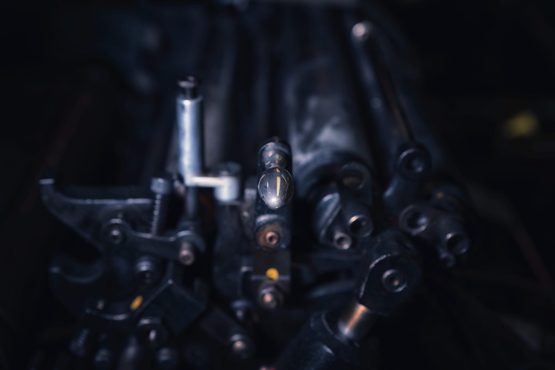 large group of objects, high angle view, black color, background, gun, antique, contrast, copy space, crime, retro rech, handle, anger, museum, security