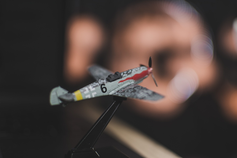 focus on foreground, fantasy, communication, 5K, draw, paper, gun, flying, equipment, model, women, arts culture and entertainment, airplane, frame, old