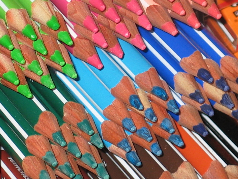 drawing lessons, wood - material, wooden pegs, crayons, color, no people, pointed, arrangement, blue, school, day, order, table, writing accessories, art