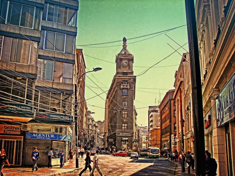 city street, tower, street, skies, building, real people, wires, sky, city, valparaiso, incidental people, day, transportation, pinochet, built structure