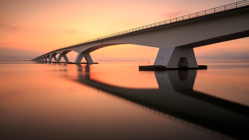 nature, orange color, sunset, built structure, connection, sky, transportation, dusk, white, bridge, evening, reflection, no people, architectural column