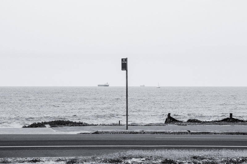 beach, ocean, seaside, sky, minimal, coast, sea, tranquility, land, outdoors, 4K, sign, tranquil scene, nature, white, street light, ships, water, horizon
