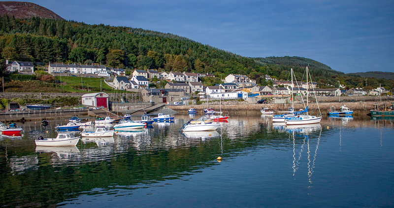 nautical vessel, built structure, village, boats, city, yacht, mountain, harbor, harbour house newcastle, mode of transportation, bay, building exterior