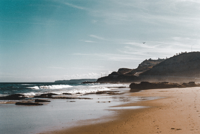 nature, tranquility, day, ocean, scenics - nature, rocks, wave, australia, motion, beauty in nature, sky, hang gliders, cliff, no people, film, land, horizon over water