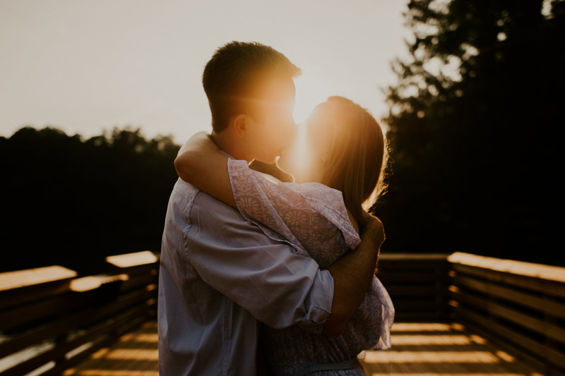 standing, togetherness, man, sitting, hold, woman, girlfriend, smiling, park - Man Made Space, couple - Relationship, carefree, loving, young Women, flirting