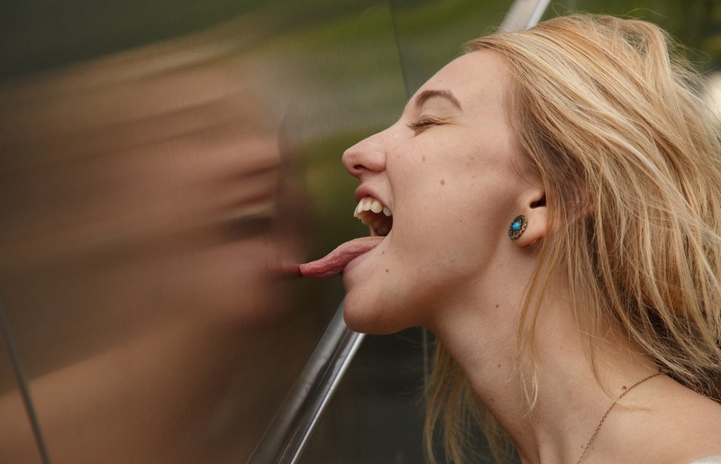 outdoors, leisure activity, focus on foreground, profile view, blond hair, licking, Lily Ivy, portrait, teenager, young adult, hairstyle, 1080P, contemplation