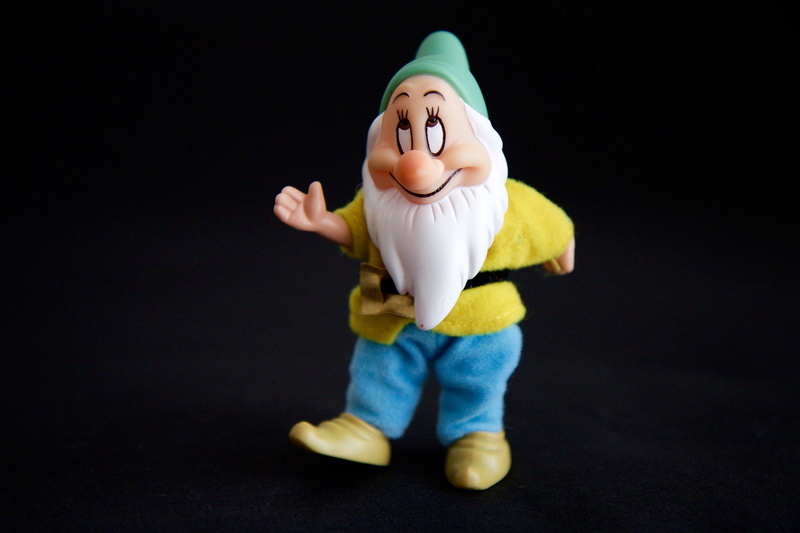 gesture, invitation, figure, child, males, people, innocence, studio shot, emotion, small, toy, black background, smurf, courtesy, costume, representation