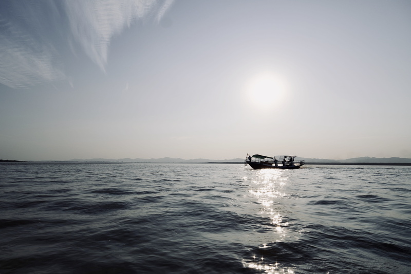 watercraft, scenics - nature, myanmar, motion, sky, vehicle, sunlight, waterfront, leisure activities, horizon over water, day, sea, pangan, tranquility