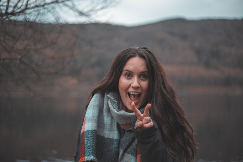 5K, scarf, mountains, human, wate, portrait, long hair, apparel, female, sleeve, young woman, orange, beautiful woman, england, r, young adult, one person