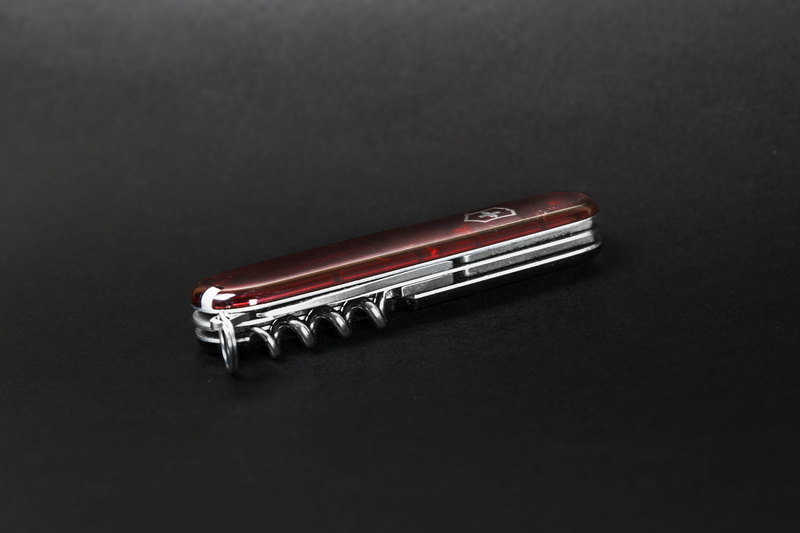 sharp, writing instrument, cut out, red, corkscrew, 5K, black background, opener, gray, indoors, no people, close-up, high angle view, multifunction, single object