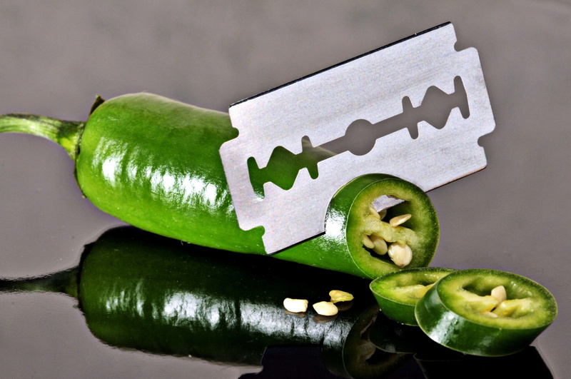 knife, studio shot, indoors, wellbeing, slice, close-up, creativity, sharp, healthy eating, fruit, razor blade, nature, no people, cucumber, still life