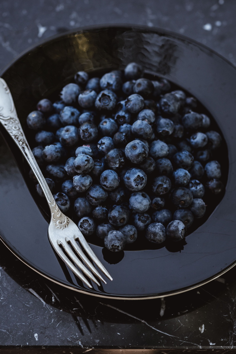 close-up, large group of objects, wellbeing, antioxidant, still life, freshness, vintage, black, food, cutlery, table, fruit, marble table, blueberry, high angle view