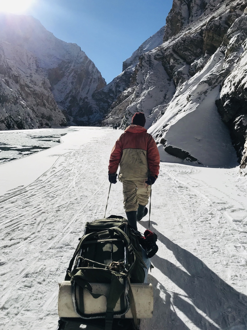 apparel, sport, piste, nature, slope, peak, lifestyles, outdoors, person, snowcapped mountain, sled, full length, clothing, rear view, sleeve, one person