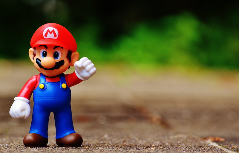 child, cute, front view, super, outdoors, cartoon, video game, red, headwear, computer game, toy, playing, photography, people, focus, video, shallow, fun