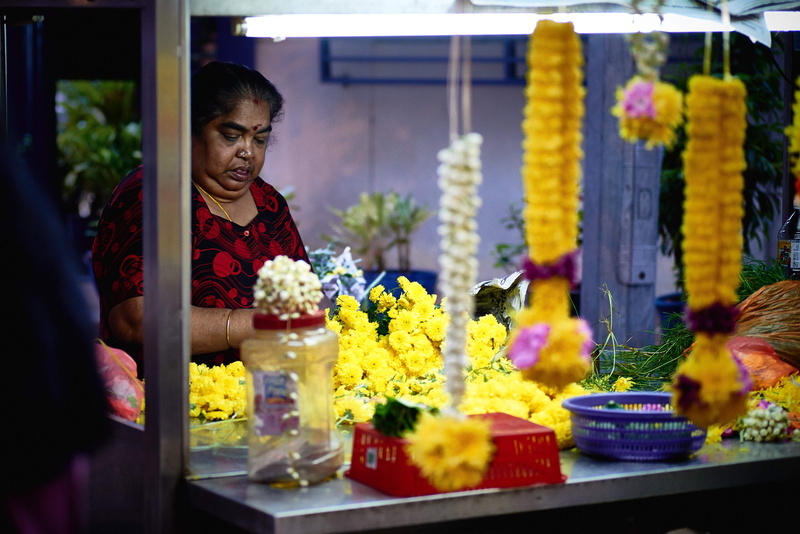 adult, small, store, leis, flower, natural, colorful, person, waist up, stand, market, business, small business, mature adult, mid adult, retail, consumerism