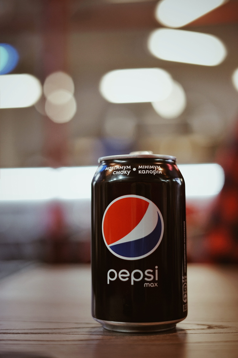 text, soda, 5K, focus on foreground, pepsi, technology, red, can, food and drink, table, lens flare, indoors, refreshment, no people, bottle, number, western script