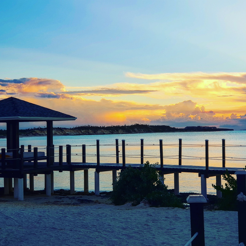 beachfront, outdoors, beach, sand, tranquil scene, cloud - sky, horizon over water, 2K, beauty in nature, water, nature, sea, railing, non-urban scene