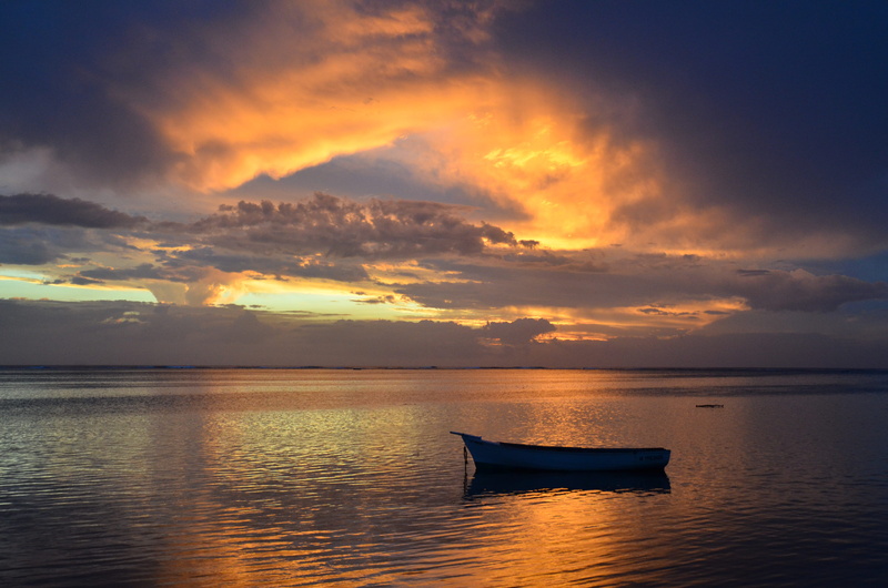 beauty in nature, mode of transportation, tranquil scene, transportation, gold, cloud - sky, pirogue, scenics - nature, tranquility, mauritius, idyllic