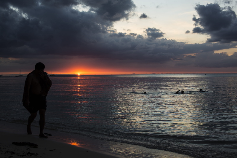 leisure activity, 5K, orange color, mauritius, ocean, cloud - sky, nature, horizon over water, sunset, real people, horizon, land, man, full length, lifestyles