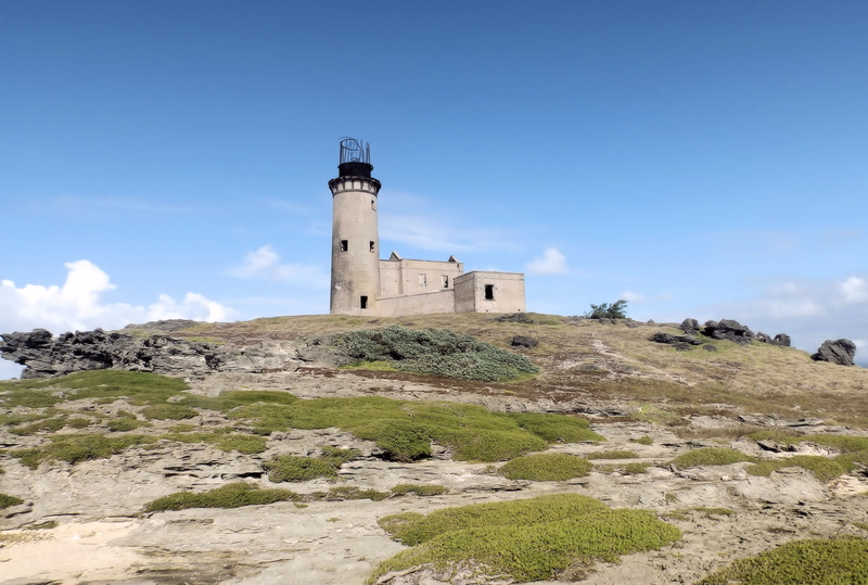 building exterior, tower, building, lantern, solid, low angle view, lighthouse, sky, the past, architecture, travel, hill, outdoors, mauritius, guidance