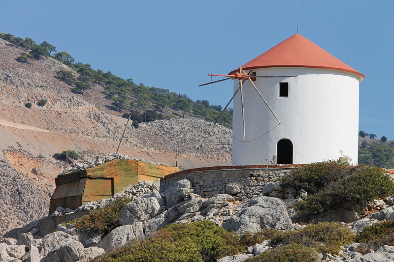 masonry, old, greece, wind turbine, built structure, stone wall, tower, facade, symi, environment, pinwheel, environmental conservation, wind, sky, no people