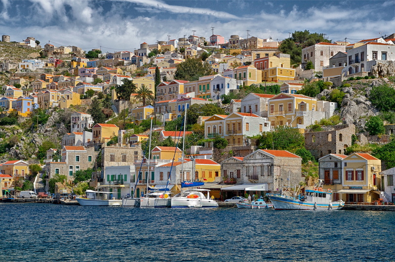 no people, bay, harbor, houses, shoreline, body, cloud - sky, architecture, skyline, boats, city, sky, mode of transportation, day, boat, travel destinations