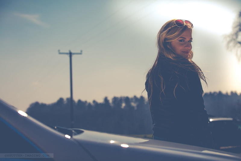 portrait, hair, hairstyle, young adult, mode of transportation, motor vehicle, blonde, beautiful woman, transportation, glasses, focus on foreground, sunglasses