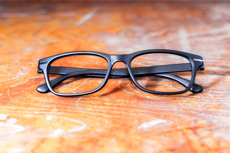 black, copy space, single object, close-up, frames, reading glasses, eye test equipment, no people, framed, care, modern, glasses, 1080P, fashion, indoors