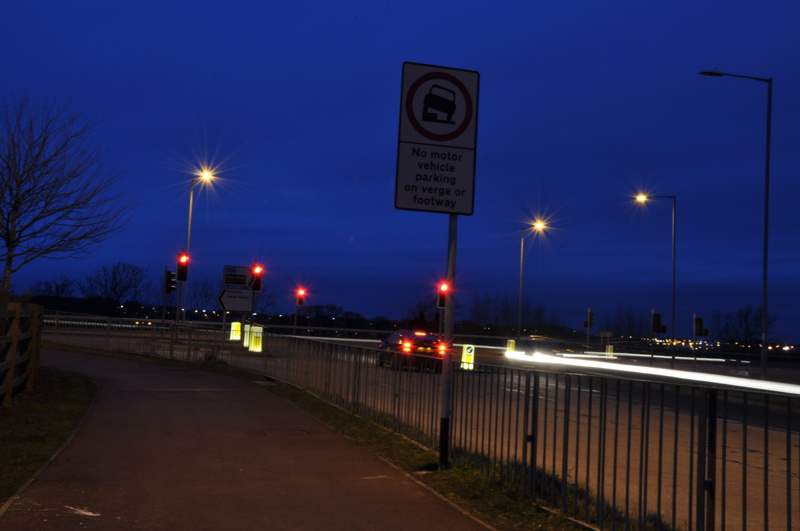 street light, road sign, sky, information, no people, dusk, nature, light, lighting equipment, guidance, car, transportation, information sign, communication