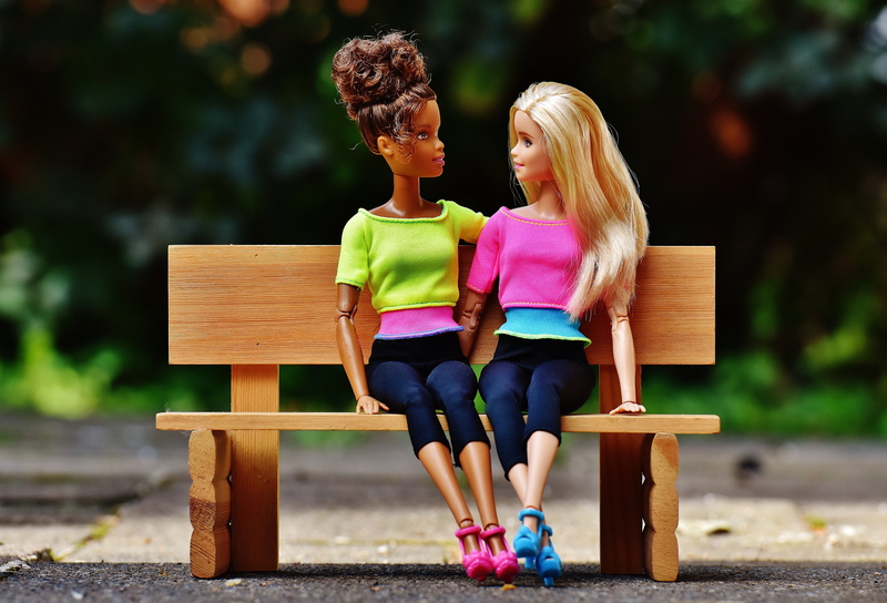 sitting, two, barbie, family, park - man made space, sister, women, dolls, childhood, child, hairstyle, park bench, young adult, teenager, doll, children toys