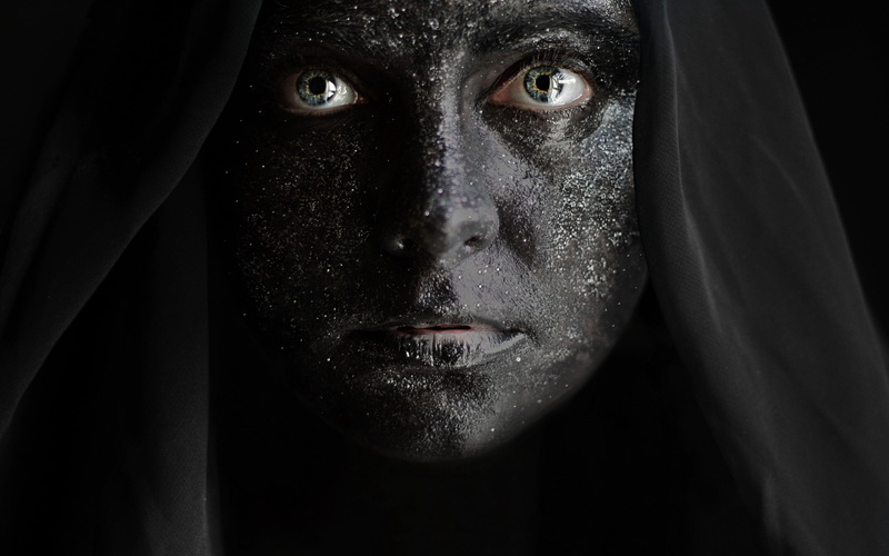 body part, headshot, mystery, close-up, witch, indoors, halloween, scarf, black Color, 2K, hood, one Person, face, horror, looking, spooky, evil, s, beauty