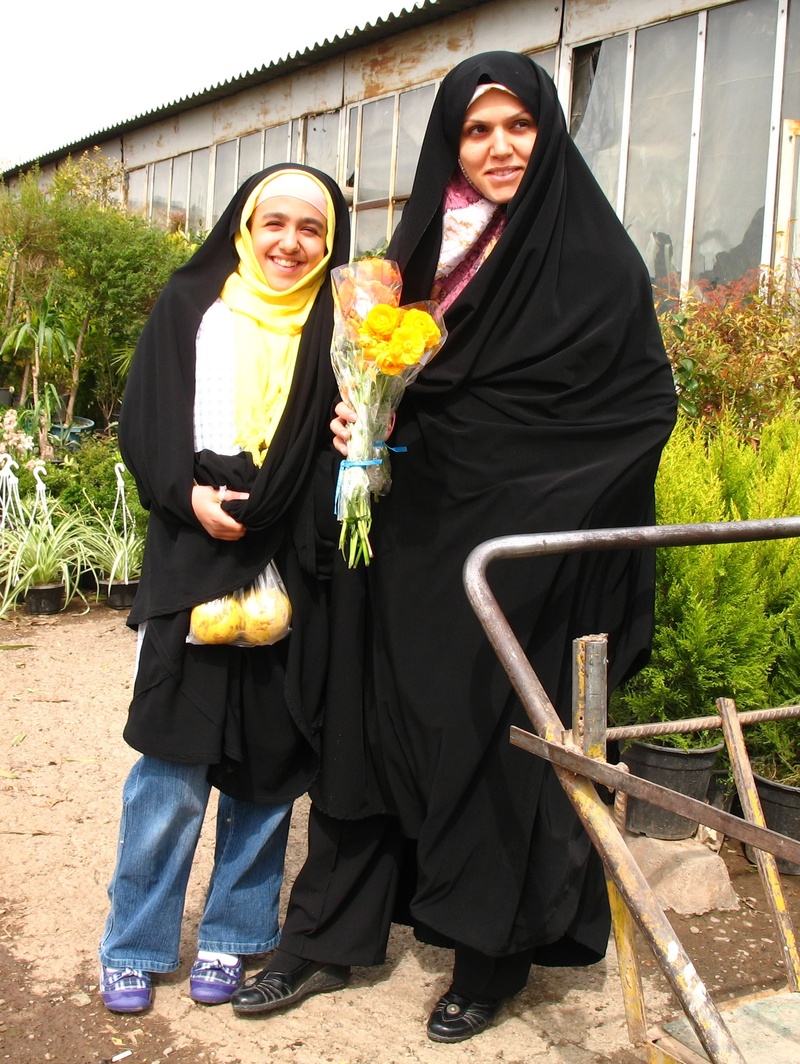 middle Eastern Culture, cheerful, plant, emotion, lifestyles, united Arab Emirates, mother, full length, family, abaya, women, arabia, daughter, flower arrangement