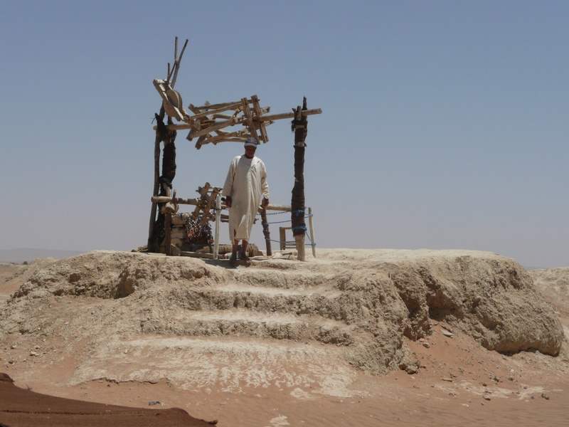 2K, desert, creativity, cross, spirituality, water, outdoors, south, no people, built structure, the past, belief, sculpture, adventure, earth, sky, oasis tuareg