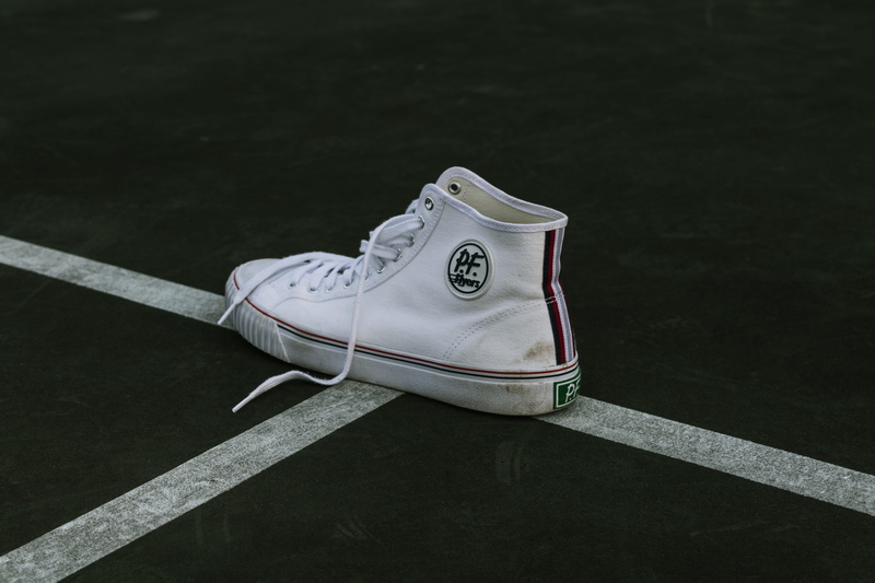 sunlight, no people, playground, white, apparel, transportation, dirt, unpaired, absence, lines, tennis court, two objects, close-up, tennis