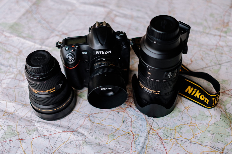 camera - Photographic Equipment, cmeras, dslr, photograph, map, photographic Equipment, navigational compass, indoors, camera, lens, equipment, focus on foreground