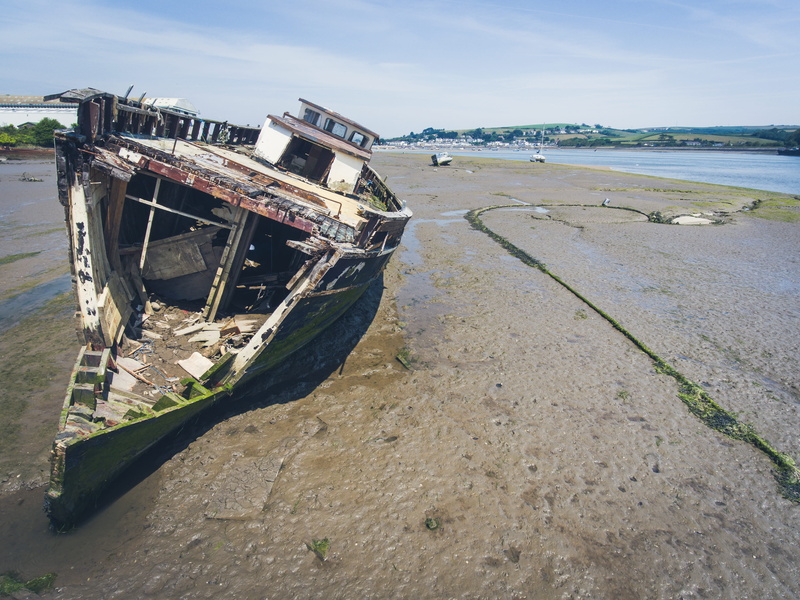 mode of transportation, sky, land, abandoned, nature, sinking, day, old, ruined, outdoors, transportation, damaged, ship, boat, river, shipwreck, low tide